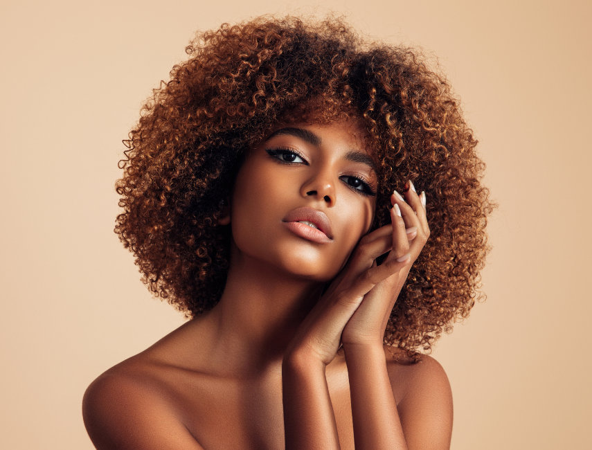 Beautiful girl with curly hairstyle