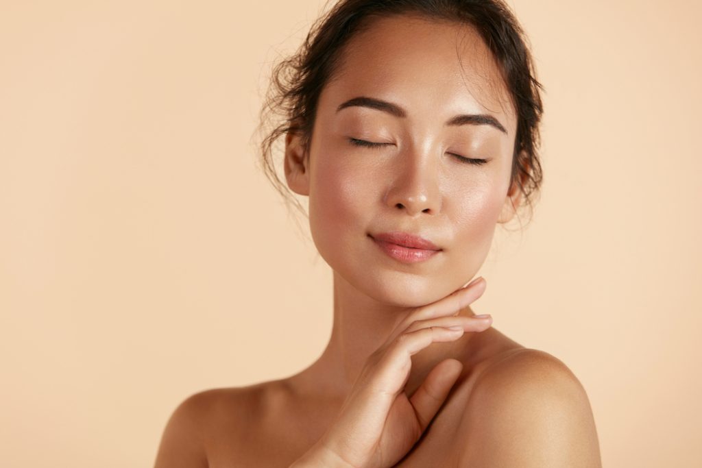 Woman with natural makeup and healthy skin portrait. 